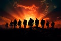 Dramatic backdrop enhances the impact of silhouetted soldiers in action Royalty Free Stock Photo