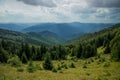 Dramatic beautiful Carpathian Mountains nature landscape photography from above with horizon view of sun light rays Royalty Free Stock Photo