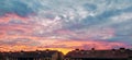 Dramatic beautiful clouds during sunset. Cumulus clouds illuminated in orange and pink. Dark and gray tones. Banner Royalty Free Stock Photo