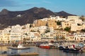 Dramatic, beautiful Naxos town View of the waterfront with boats at harbor on a summer evening