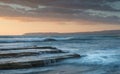 Beautiful dramatic Sunset over a rocky coast Royalty Free Stock Photo