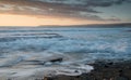 Beautiful dramatic Sunset over a rocky coast Royalty Free Stock Photo