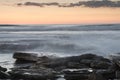 Beautiful dramatic Sunset over a rocky coast Royalty Free Stock Photo