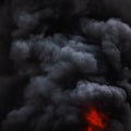 Dramatic black motion clouds of strong fire smoke covered sky Royalty Free Stock Photo