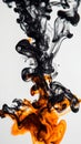 Dramatic black and orange ink flow in water Royalty Free Stock Photo