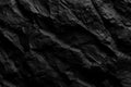 Dramatic black rock texture provides a dark abstract stone surface design. Royalty Free Stock Photo