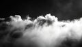 Dramatic black and white cloud formation A highcontrast image capturing the intense texture of clouds against a dark sky Royalty Free Stock Photo