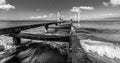 Dramatic image of an eroded pier off the caribbean coast