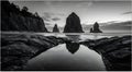 Dramatic Black and White Long Exposure Sea Stacks at Low Tide Aceh Royalty Free Stock Photo