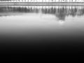 Dramatic black and white river reflections city background Royalty Free Stock Photo