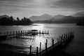Dramatic Black And White Sunset At Derwentwater Lake In The Lake District With Haze Over Mountains. Royalty Free Stock Photo
