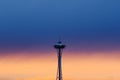 dramatic blue, orange winter sunset behind Space Needle in Seattle