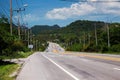 Dramatic blue sky with green fields in the countryside road Royalty Free Stock Photo