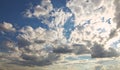 Dramatic blue sky with rays and white clouds Royalty Free Stock Photo