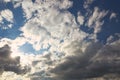 Dramatic blue sky with rays and white clouds Royalty Free Stock Photo