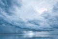 Dramatic blue sky at the sea with clouds reflection in water, Dark color Royalty Free Stock Photo