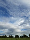 Dramatic blue sky with some grey clouds. Concept of immensity