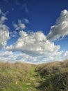 Dramatic blue sky with white clouds over the ruins of the ancient greek colony of Histria, on the shores of Black Sea. Histria is Royalty Free Stock Photo