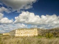 Dramatic blue sky with white clouds over the ruins of the ancient greek colony of Histria, on the shores of Black Sea. Histria is Royalty Free Stock Photo