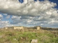 Dramatic blue sky with white clouds over the ruins of the ancient greek colony of Histria, on the shores of Black Sea. Histria is Royalty Free Stock Photo