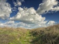 Dramatic blue sky with white clouds over the ruins of the ancient greek colony of Histria, on the shores of Black Sea. Histria is Royalty Free Stock Photo