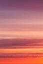 Dramatic bright soft sunrise, sunset pink orange red sky with clouds background Royalty Free Stock Photo