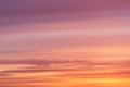 Dramatic bright soft sunrise, sunset pink orange sky with clouds background texture Royalty Free Stock Photo