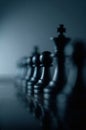 A single chess pawn leads the line, embodying strength, focus, and silent authority Royalty Free Stock Photo