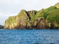 Dramatic cliffs at the entrance to Heimaey harbour