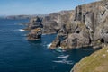 The dramatic cliffs at Mizen Head, County Cork, Ireland where the Atlantic Ocean crashes against the rocks Royalty Free Stock Photo