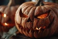 Close-Up of Glowing Carved Pumpkin with Flickering Flame and Chiaroscuro Lighting Royalty Free Stock Photo