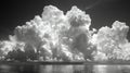 Dramatic cloud formations looming over a calm sea