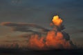 Dramatic cloud reflecting sunset