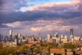 Dramatic clouds above the downtown Toronto skyline lighting up with color at sunset