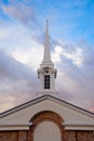 Dramatic Clouds Behind White Church Spire Royalty Free Stock Photo