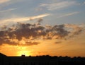 Dramatic clouds over the city. Beautiful sunset.