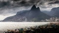 Dramatic clouds over a crowded Ipanema and Leblon beaches in Rio de Janeiro, Brazil Royalty Free Stock Photo