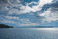 Dramatic clouds over islands at northern part of aegean sea Royalty Free Stock Photo