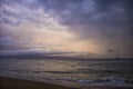 Dramatic Clouds over Ocean Sunset with Boats as Hurricane Storm Royalty Free Stock Photo