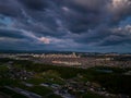 Dramatic clouds over small suburban development at dusk
