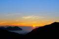 Dramatic Clouds rolling over mountains at sunrise-Hehuan shan/ Joy mountain Royalty Free Stock Photo