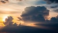 Dramatic Clouds at Sunset with Golden Sunlight and Dark Sky Royalty Free Stock Photo