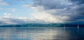 Dramatic clouds and yachts on the ocean in Puerto Jimenez, Costa Rica. Royalty Free Stock Photo