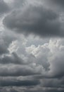 A dramatic cloudscape with dark, ominous storm clouds filling the sky above Royalty Free Stock Photo