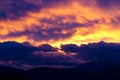 Dramatic cloudscape over silhouette hills