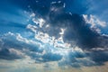 Dramatic cloudy sky clouds with real sun beams Royalty Free Stock Photo