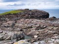 Dramatic coastal scenery of rock strata at the Nev of Stuis on the island of Yell, Shetland, Scotland, UK