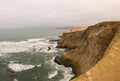 Dramatic coastline with intense colors in the desert of Paracas National Reserve Royalty Free Stock Photo