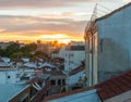 Dramatic color sunset rooftops of Madrid. Glowing fiery orange Madrid sky & rooftops at sunset.