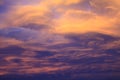 Dramatic and colorful cloudy sunset sky with violet and hints